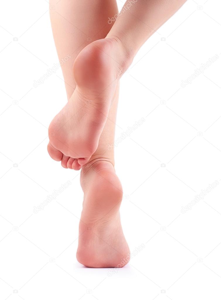 Female feet isolated on white