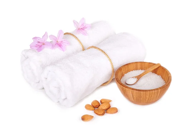 Spa items: flowers with towels and salt isolated — Stock Photo, Image