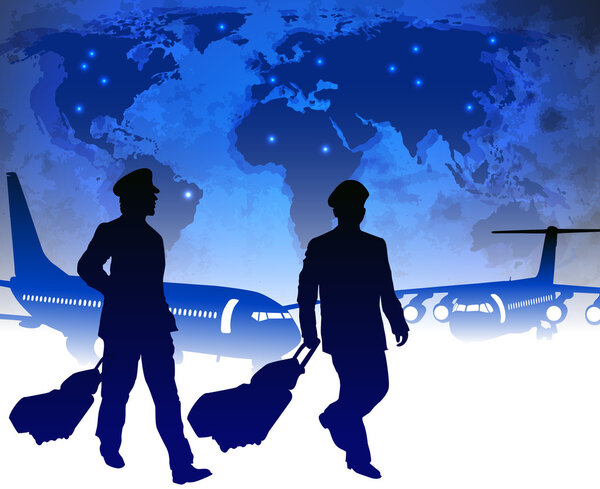 Airline pilots with luggage in airport