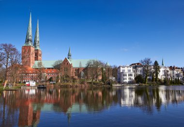 Trave river, old town of Lubeck, Germany  clipart