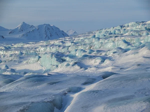 Tipico paesaggio invernale artico - ghiacciaio blu Fotografia Stock