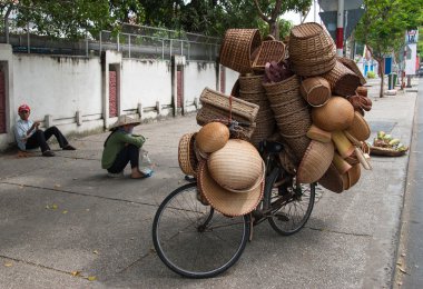 Selling baskets in Vietnam clipart