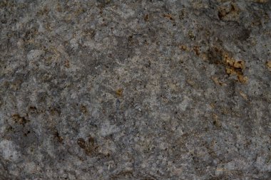 Taş cilt arkaplanı için siyah lav taşı dokusunu kapat