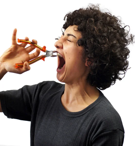 Young woman pulls her tooth out — Stock Photo, Image