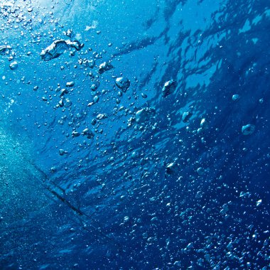 soyut mavi sualtı yüzey ve hava kabarcıkları