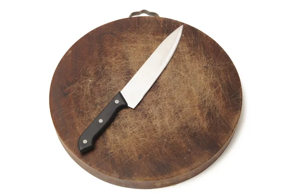 Кухонный нож и разделочная доска — стоковое фото