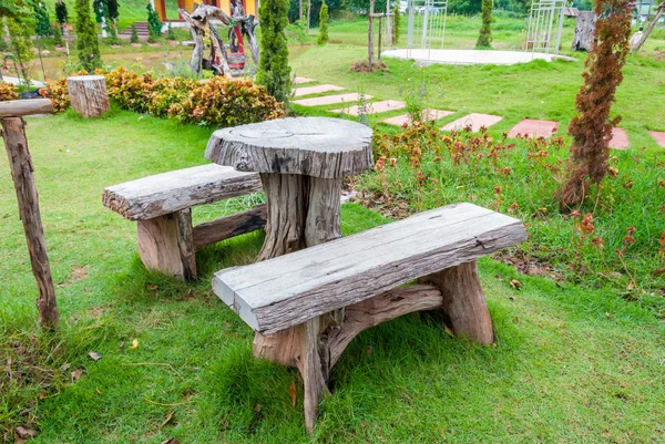 The empty wooden table and bench in garden or park — Stock Photo, Image