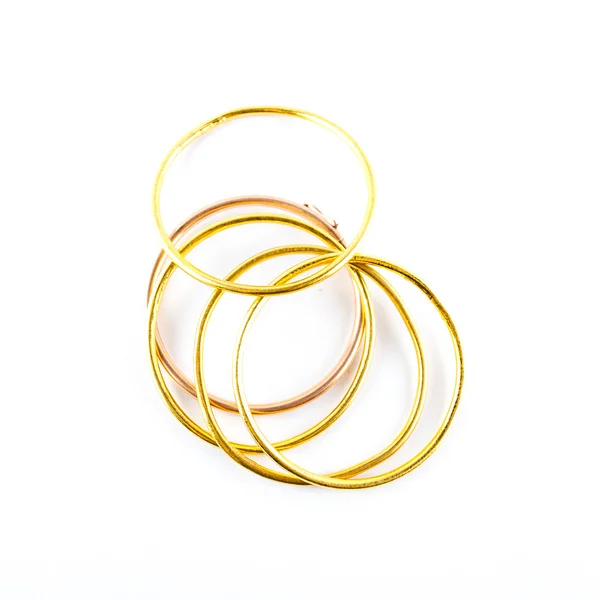 Golden bracelets - bracelets isolated on the white background — Stock Photo, Image