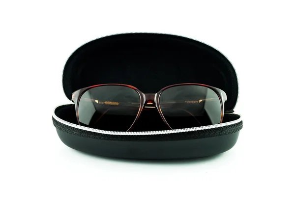 Brown sunglasses in black case isolated on white - eyeglasses in box — Stock Photo, Image