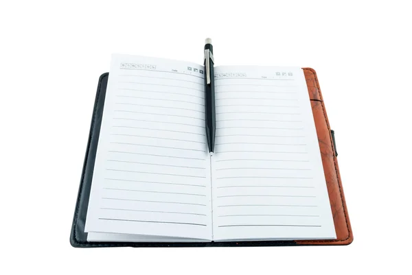 Kalem veya üzerinde beyaz izole kalem ile boş bir not defteri açın — Stok fotoğraf