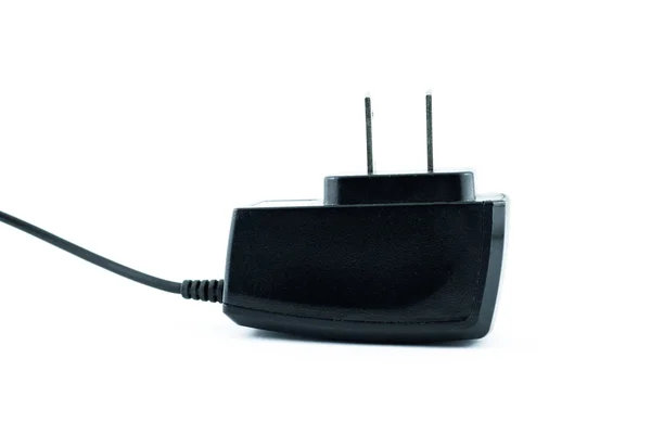 Caricabatterie per un gadget mobile isolato su uno sfondo bianco - Caricabatterie per telefoni cellulari — Foto Stock
