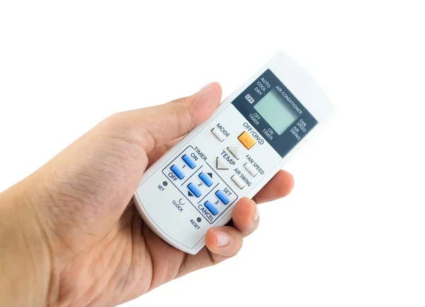 Hand is holding a remote control of air conditioner on white — Stock Photo, Image
