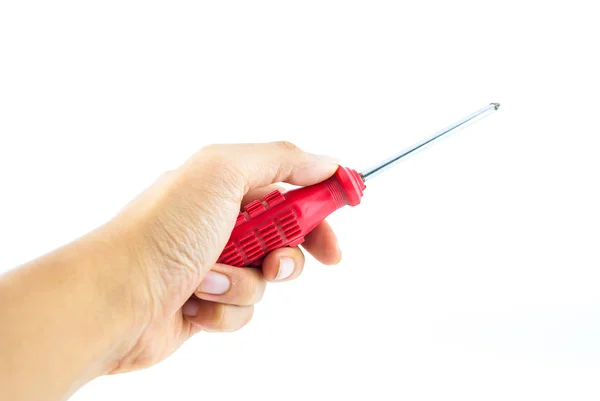 Mão segurando chave de fenda usada vermelha isolada no fundo branco — Fotografia de Stock