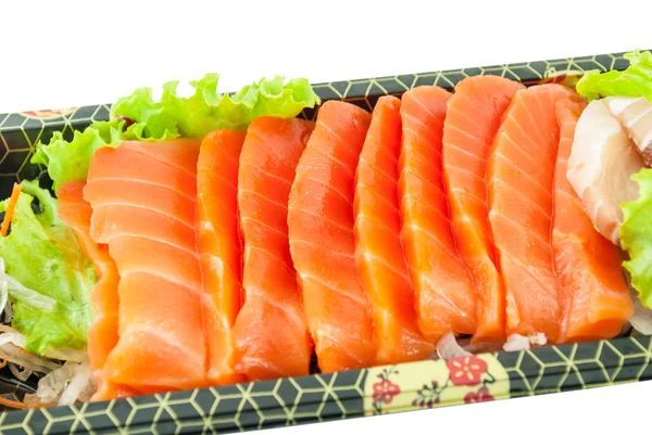 Primo piano di sashimi freschi tagliati a fette isolati su sfondo bianco — Foto Stock