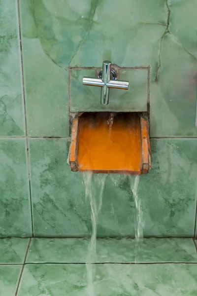 Water leaked out from wooden trough — Stock Photo, Image