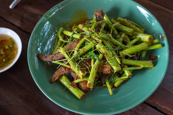 Fried green morning glory with fish meat, Thai food — Stock Photo, Image