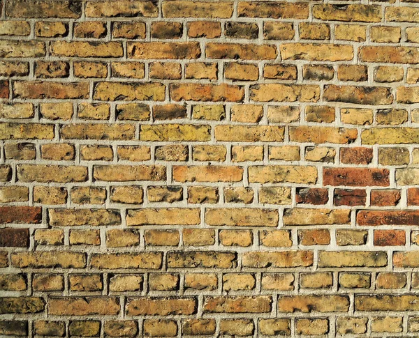 Mur z cegły żółty — Zdjęcie stockowe