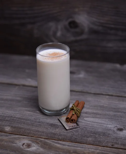 Glass of milk with cinnamon — Stock Photo, Image