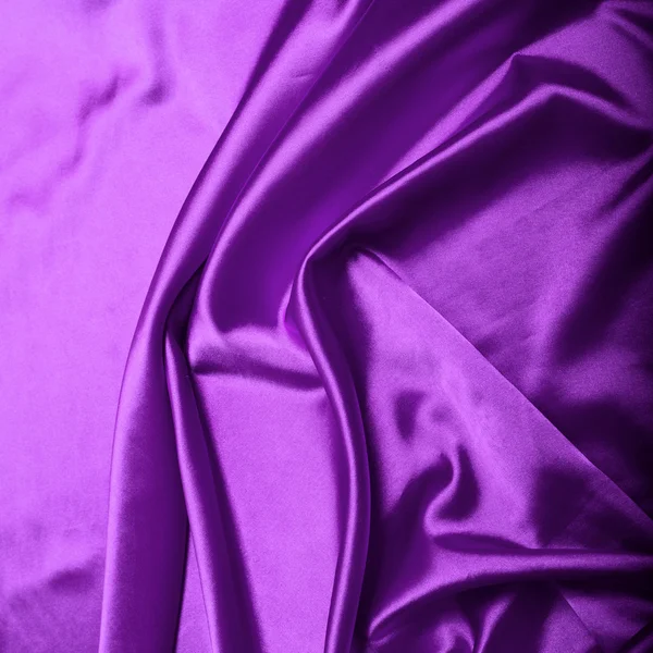 紫色のシルク背景テクスチャをクローズ アップ — ストック写真