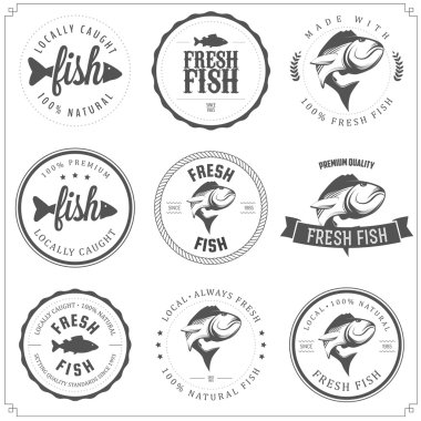 Set of made with fish stamps, labels and badges clipart