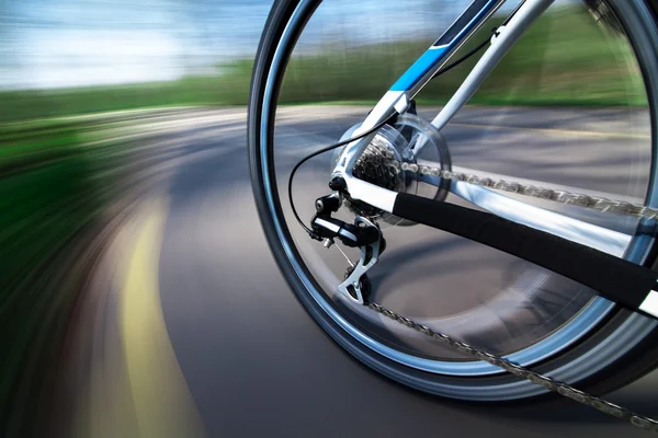 View of rear wheel with chain and cassette in motion — Stock Photo, Image