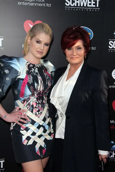 Kelly Osbourne, Sharon Osbourne at the God Bless Ozzy Osbourne Premiere Screening, Arclight Cinerama Dome, Hollywood, CA. 08-22-11 — Stock Photo, Image