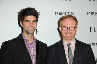 Justin Mikita, Jesse Tyler Ferguson at the ELLE Women in Television party,