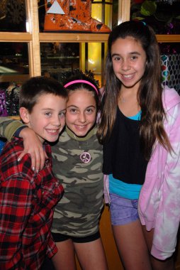 Guests at the launch of Kylie Bax and Spiros Poros' Moro Moro Kids Boot Co