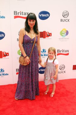 Constance Zimmer and daughter at the first ever Red CARpet Event for child