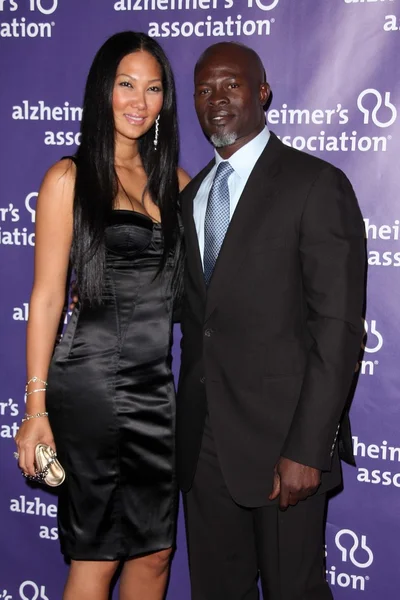 Kimora Lee and husband Djimon Hounsou — Stock Photo, Image