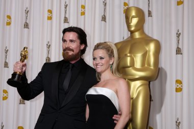 Christian Bale and Reese Witherspoon at the 83rd Annual Academy Awards Press Room, Kodak Theater, Hollywood, CA. 02-27-11