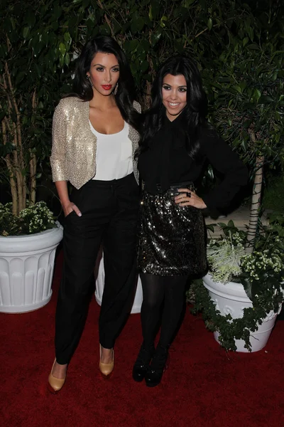 Kim Kardashian and Kourtney Kardashian at the QVC Red Carpet Style Party, Four Seasons Hotel, Los Angeles, CA. 02-25-11 — Zdjęcie stockowe
