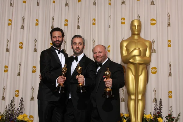 Emile Sherman, Iain Canning y Gareth Unwin en la 83ª Sala de Prensa Anual de los Premios Óscar, Kodak Theater, Hollywood, CA. 02-27-11 —  Fotos de Stock