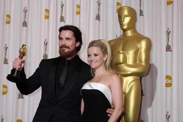 Christian Bale and Reese Witherspoon at the 83rd Annual Academy Awards Press Room, Kodak Theater, Hollywood, CA. 02-27-11 — Stock Photo, Image