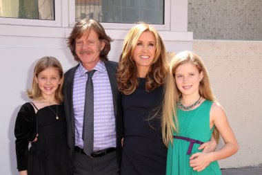 Felicity Huffman, William H. Macy and daughters at the Felicity Huffman and William H. Macy Stars on the Hollywood Walk Of Fame Ceremony, Hollywood, CA 03-07-12