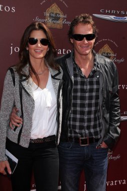Cindy Crawford, Rande Gerber at the John Varvatos 9th Annual Stuart House Benefit, John Varvatos Boutique, West Hollywood, CA 03-11-12