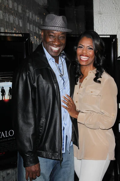 Michael Clarke Duncan and Omarosa Manigault-Stallworth at the "Act Of Valor" Los Angeles Premiere, Arclight, Hollywood, CA 02-13-12 — Stock Photo, Image