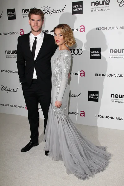 Liam Hemsworth, Miley Cyrus al 20th Annual Elton John AIDS Foundation Academy Awards Viewing Party, West Hollywood Park, West Hollywood, CA 02-26-12 — Foto Stock