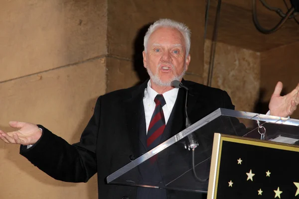 Malcolm McDowell al Malcolm McDowell Star sulla Hollywood Walk of Fame, Hollywood, CA 03-16-12 — Foto Stock