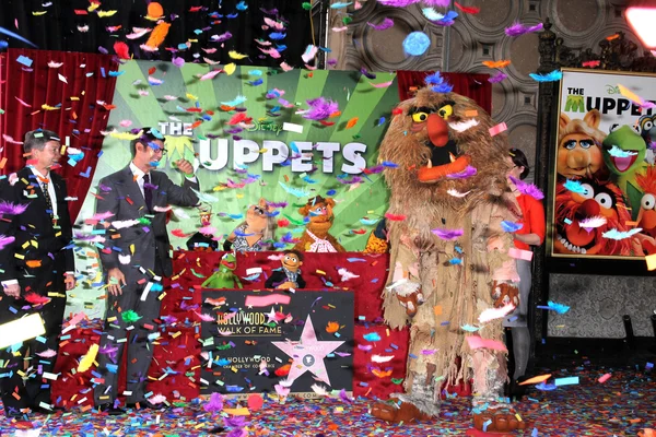 Rich Ross, Leron Gubler at the Muppets Star on the Hollywood Walk of Fame, Hollywood, CA 20-03-12 — Photo