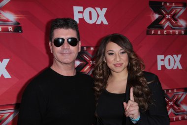 Simon cowell ve melanie amaro