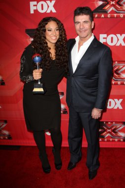 Melanie Amaro and Simon Cowel at The X Factor Season Finale, CBS Television City, Los Angeles, CA 12-22-11