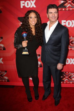 Melanie Amaro and Simon Cowel at The X Factor Season Finale, CBS Television City, Los Angeles, CA 12-22-11