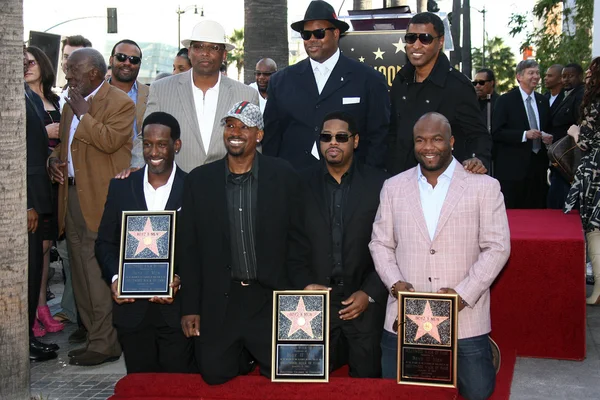 Jimmy Jam, Terry Lewis, Kenny Edmonds, Shawn Stockman, Michael McCary, Wanya Morris and Nathan Morris at the Boyz II Men Star On The Hollywood Walk Of Fame Ceremony, Hollywood, CA 01-05-12 — стоковое фото