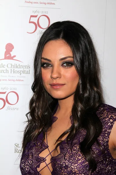 Mila Kunis en el St. Jude Children 's Research Hospital 50th Anniversary Gala, Beverly Hilton, Beverly Hills, CA 01-07-12 — Foto de Stock