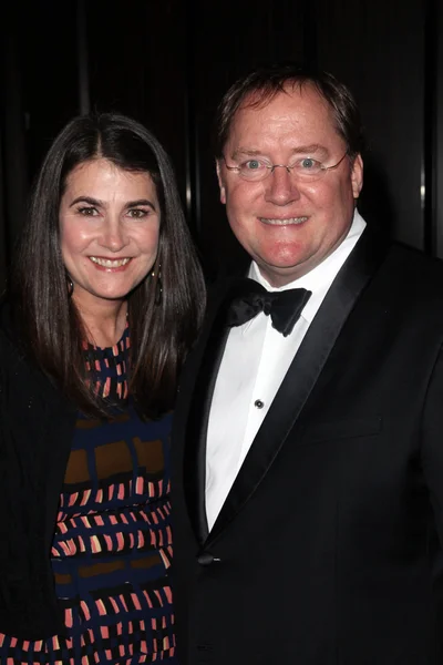 Denise riam, john lasseter bei der 23. jährlichen auszeichnung der produzentengilde, beverly hilton, beverly hills, ca 21.01-12 — Stockfoto