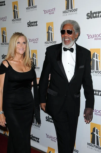 Lori McCreary and Morgan Freeman at the 14th Annual Hollywood Awards Gala, Beverly Hilton Hotel, Beverly Hills, CA. 10-25-10 — стокове фото