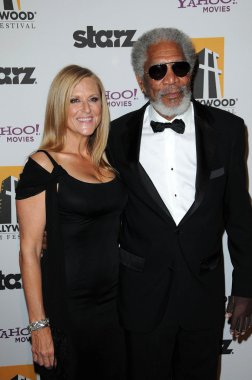 Lori McCreary and Morgan Freeman at the 14th Annual Hollywood Awards Gala, Beverly Hilton Hotel, Beverly Hills, CA. 10-25-10