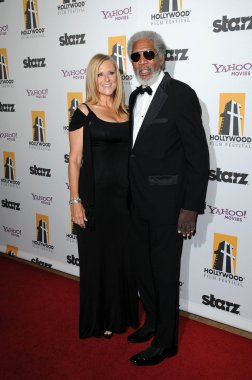 Lori McCreary and Morgan Freeman at the 14th Annual Hollywood Awards Gala, Beverly Hilton Hotel, Beverly Hills, CA. 10-25-10