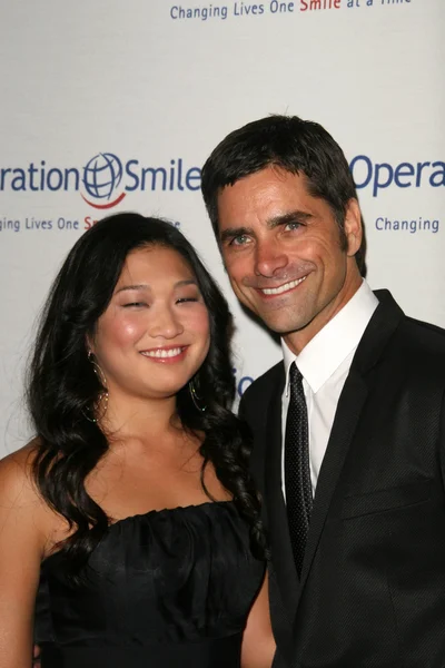 Jenna Ushkowitz and John Stamos at the 9th Annual Smile Gala Benefiting Operation Smile, Beverly Wilshire Hotel, Beverly Hills, CA. 09-24-10 — Stok fotoğraf